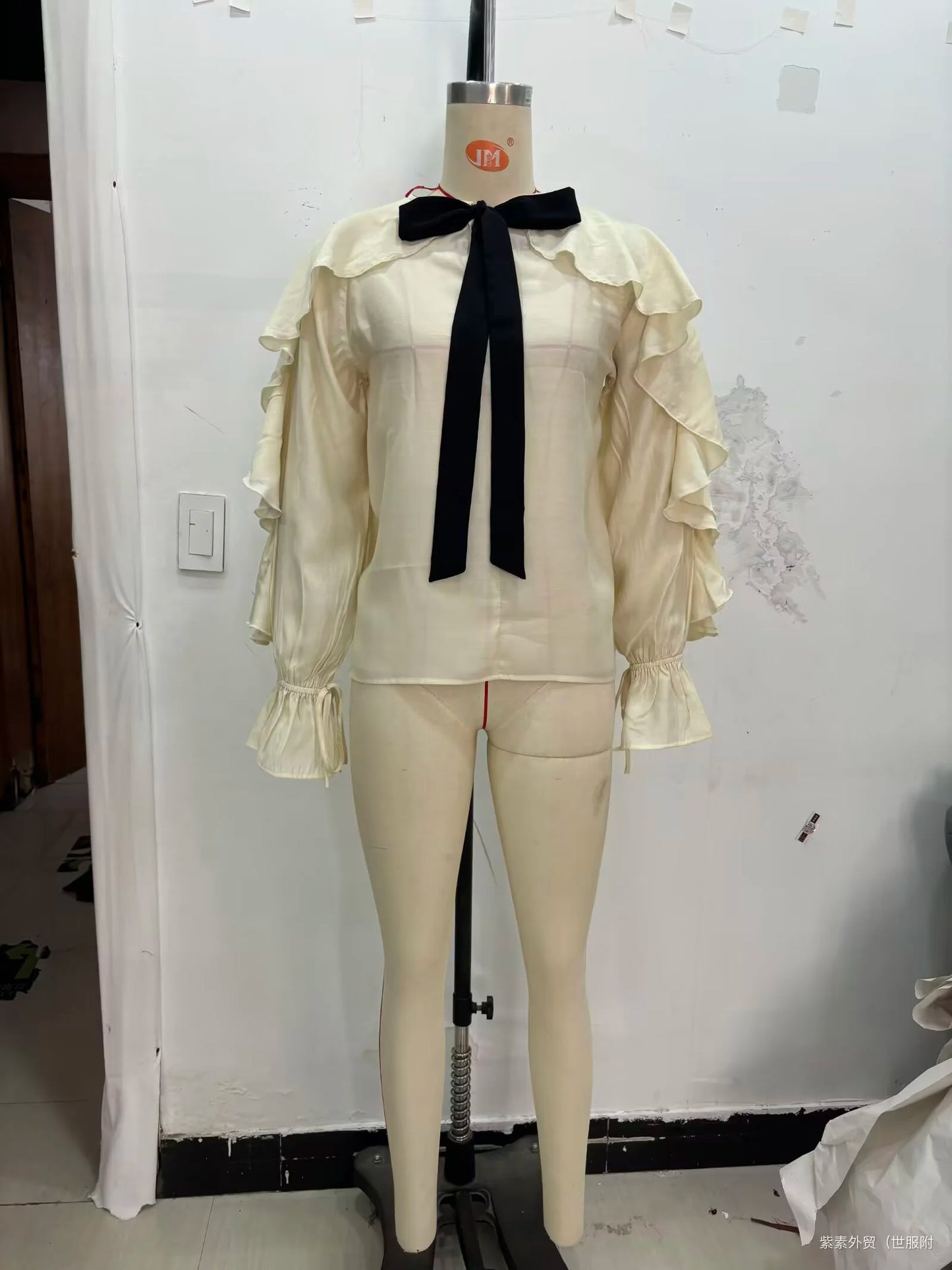 Summer 2025 new women's clothing with European and American style temperament contrasting color ribbon ruffle edge cover shirt
