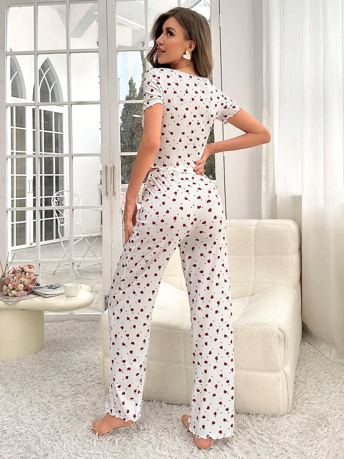 Comfortable pajama set, featuring a heart-shaped printed short sleeved top and elastic waistband with lotus edges, suitable for